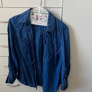 Denim button up shirt with usable pockets on each side from banana republic